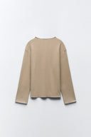 Sweater with a subtle front seam