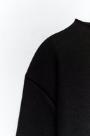 Sweater with a subtle front seam